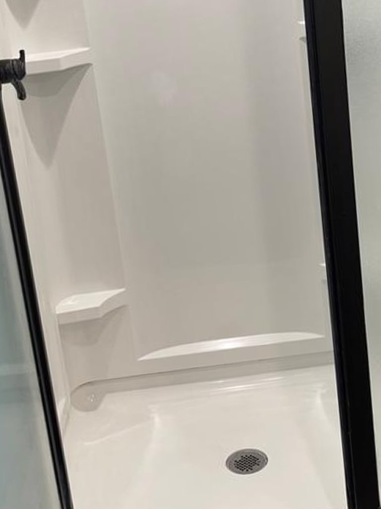 Shower after cleaning by The Cleaning Queen LLC